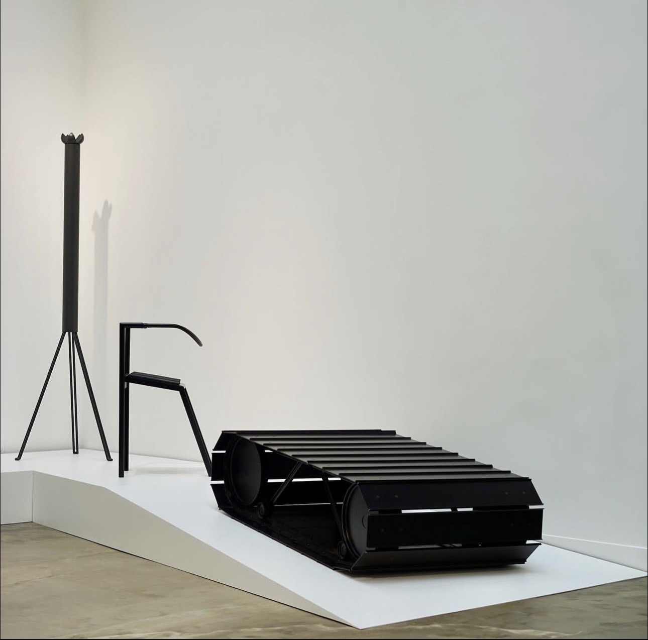 Black sculptural object, gallery view 2