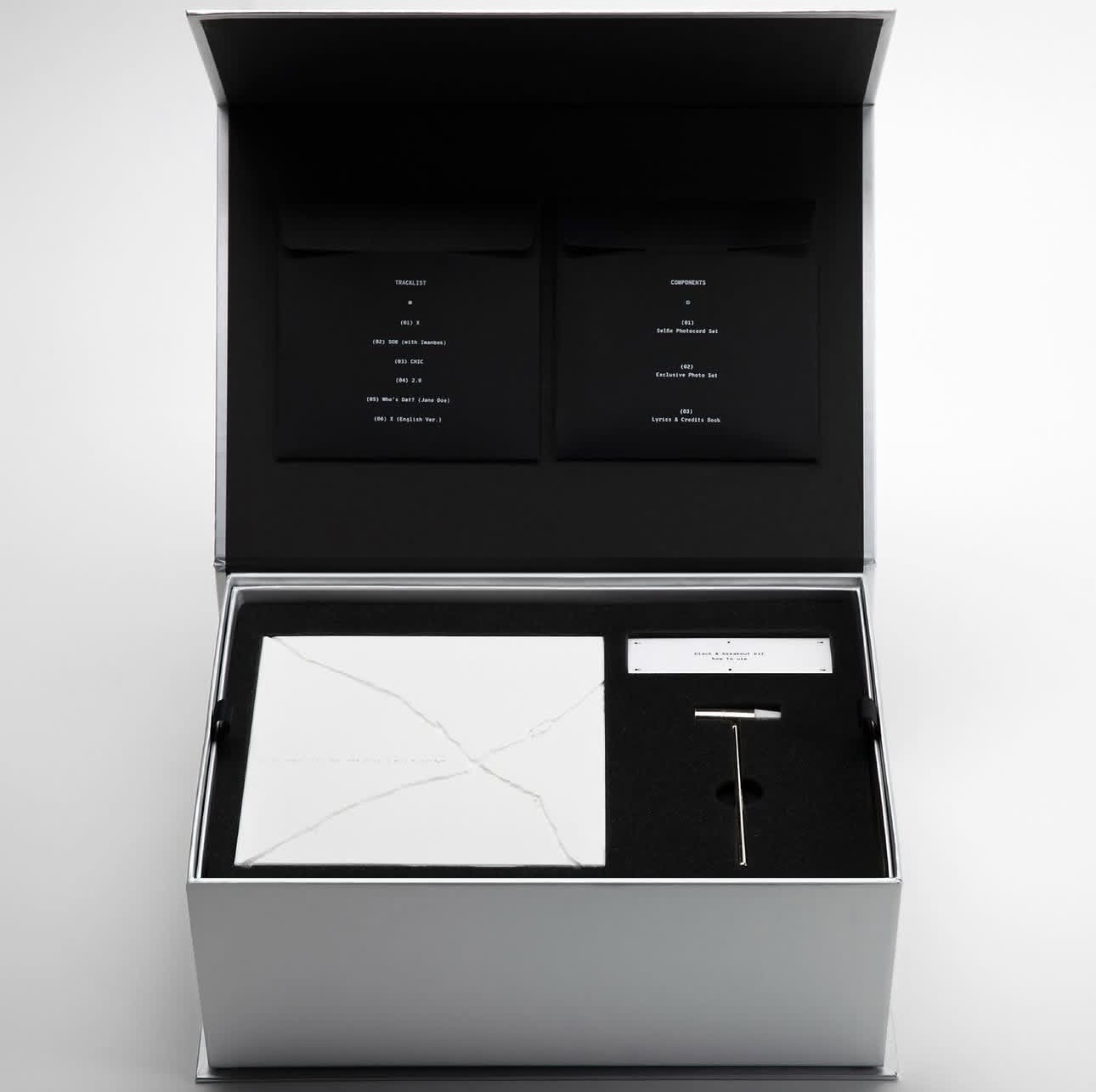 White fractured piece and presentation box, gallery view 2